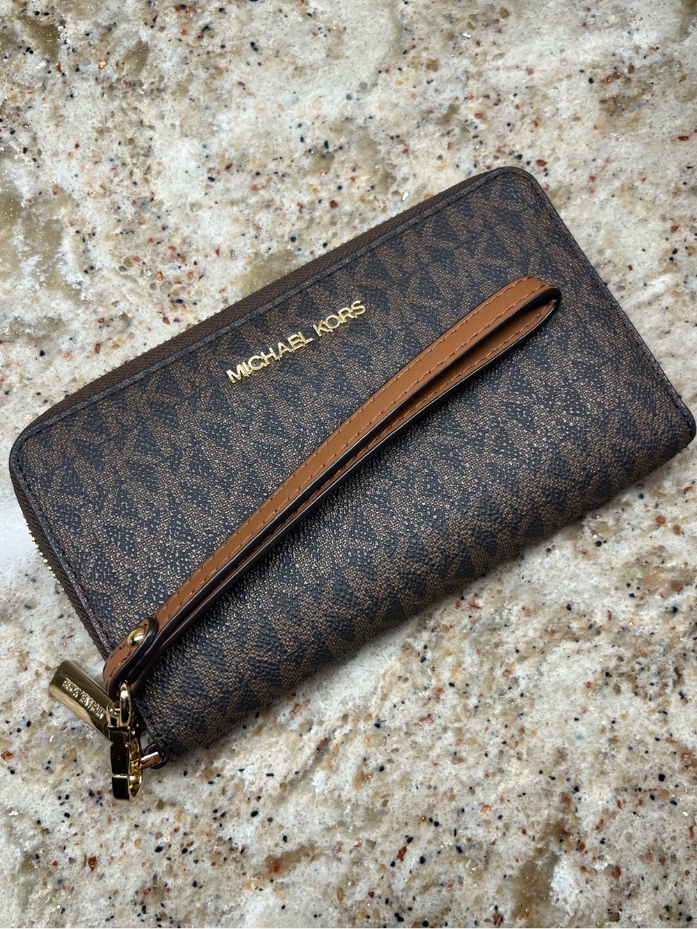 Michael Kors monogram Jet Set travel wristlet/wallet